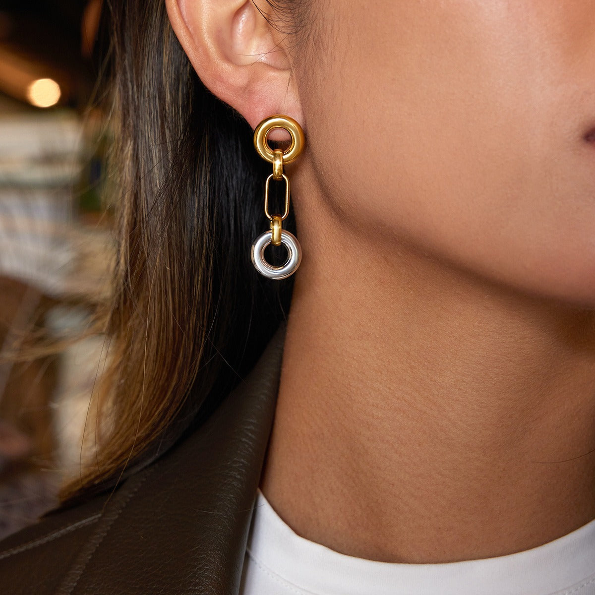 18K gold hoop earrings, a luxurious and sophisticated pair of stud earrings. Vera Lux