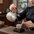 Pure 999 Fine Silver Exquisite Hand-Engraved Silver Teapot with Intricate Lotus Relief and Red Finial - Handicraft Vera Lux