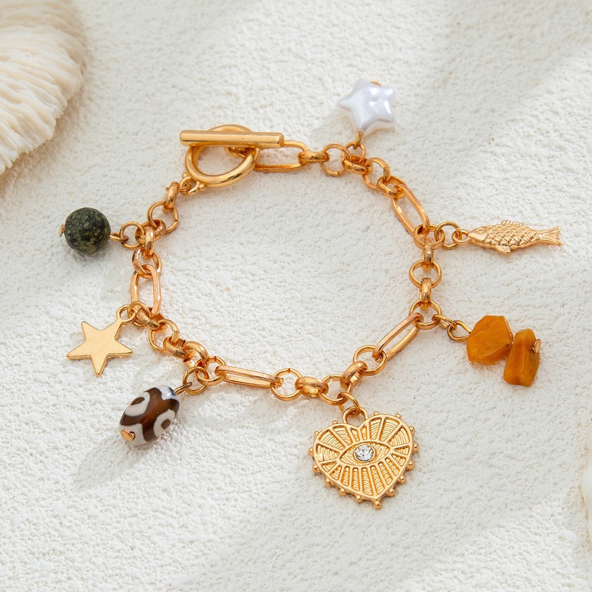 Retro elephant bull head personality niche peach heart imitation pearl shell bracelet Vera Lux