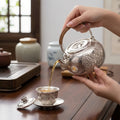 925 Sterling Silver Handcrafted Sterling Silver Floral Teapot with Woven Bamboo Handle and Hammered Texture - Handicraft Vera Lux