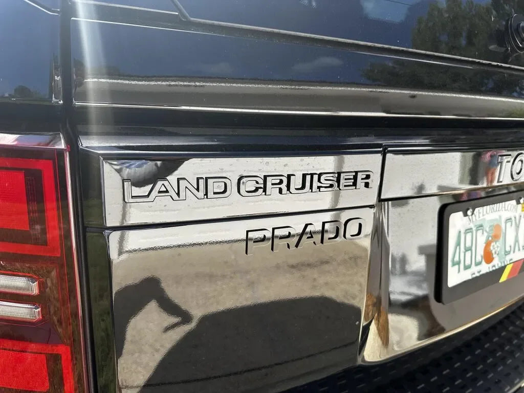 Black "PRADO" Acrylic Emblem - 2024+ Land Cruiser StickerFab