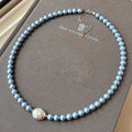 Freshwater Pearl Set: Iridescent Blue Pearl Necklace, Bracelet, and Hoop Earrings Vera Lux