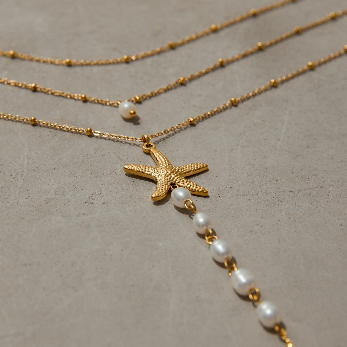 18K gold multi-layer chain with starfish and pearl tassel design exquisite and noble necklace Vera Lux