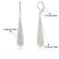 18K gold teardrop metal earrings Vera Lux