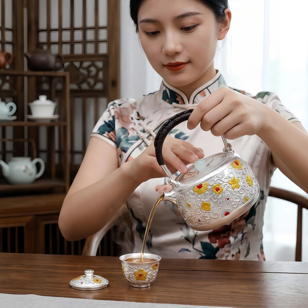 Pure 999 Fine Silver Ornate Handcrafted Silver Teapot Featuring Intricate Floral Relief and Woven Handle - Handicraft Vera Lux