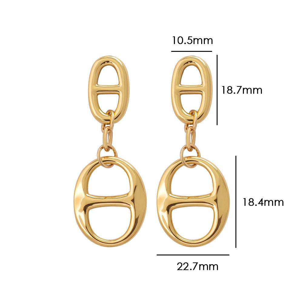 18K gold geometric-shaped necklace, bracelet, and earrings set. Vera Lux