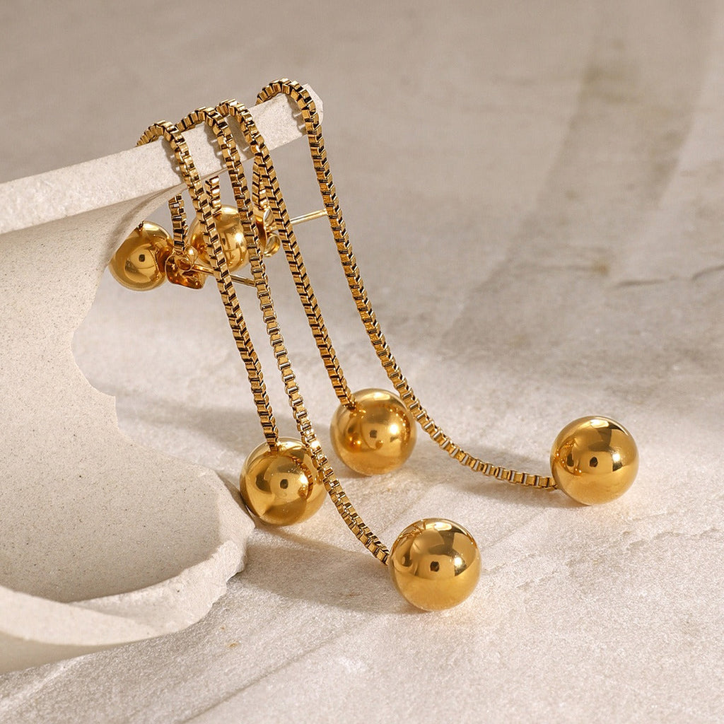 18K gold noble round beads with tassel design light luxury style earrings Vera Lux