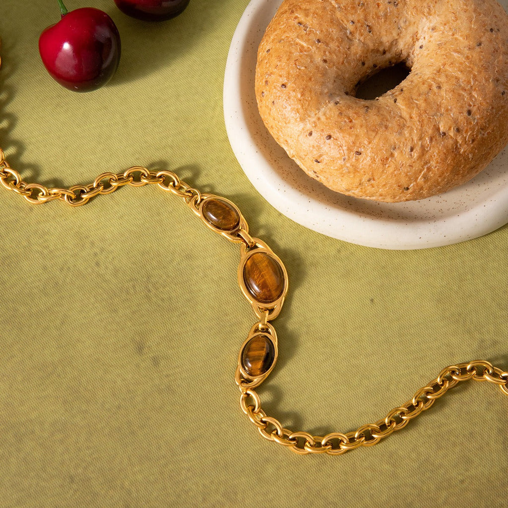 18K gold-plated titanium necklace with tiger's eye. Vera Lux