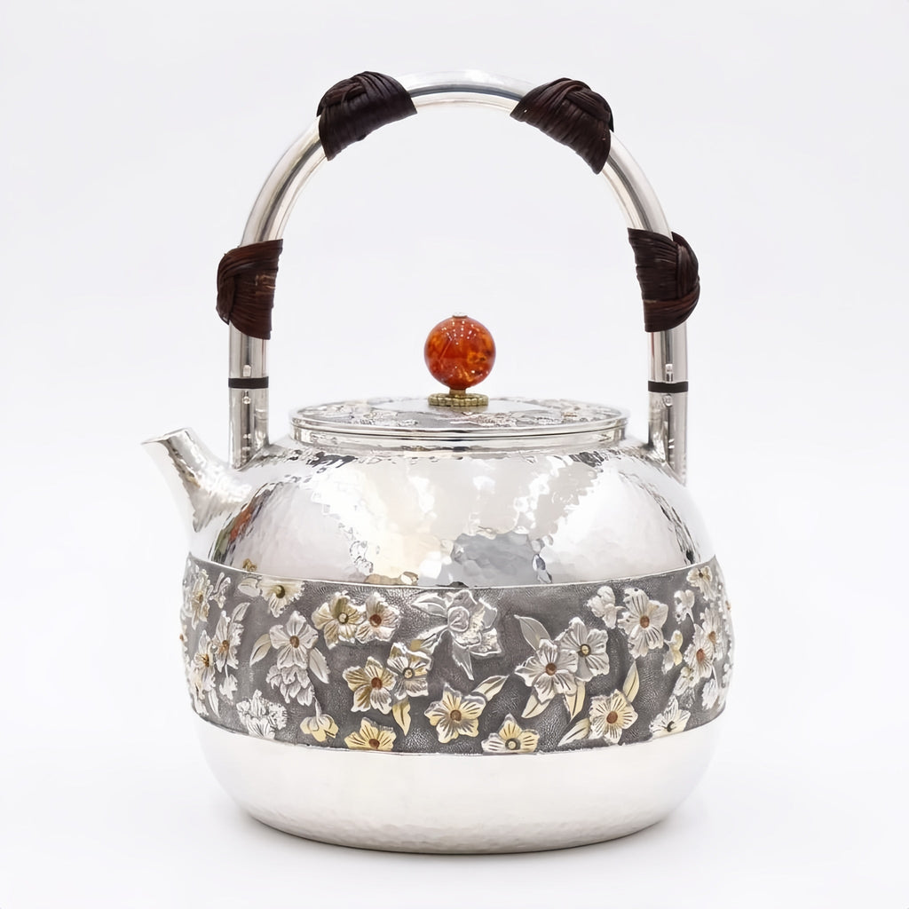 Pure 999 Fine Silver Elegant Hammered Silver Teapot with Intricate Floral Relief and Woven Handle - Handicraft Vera Lux