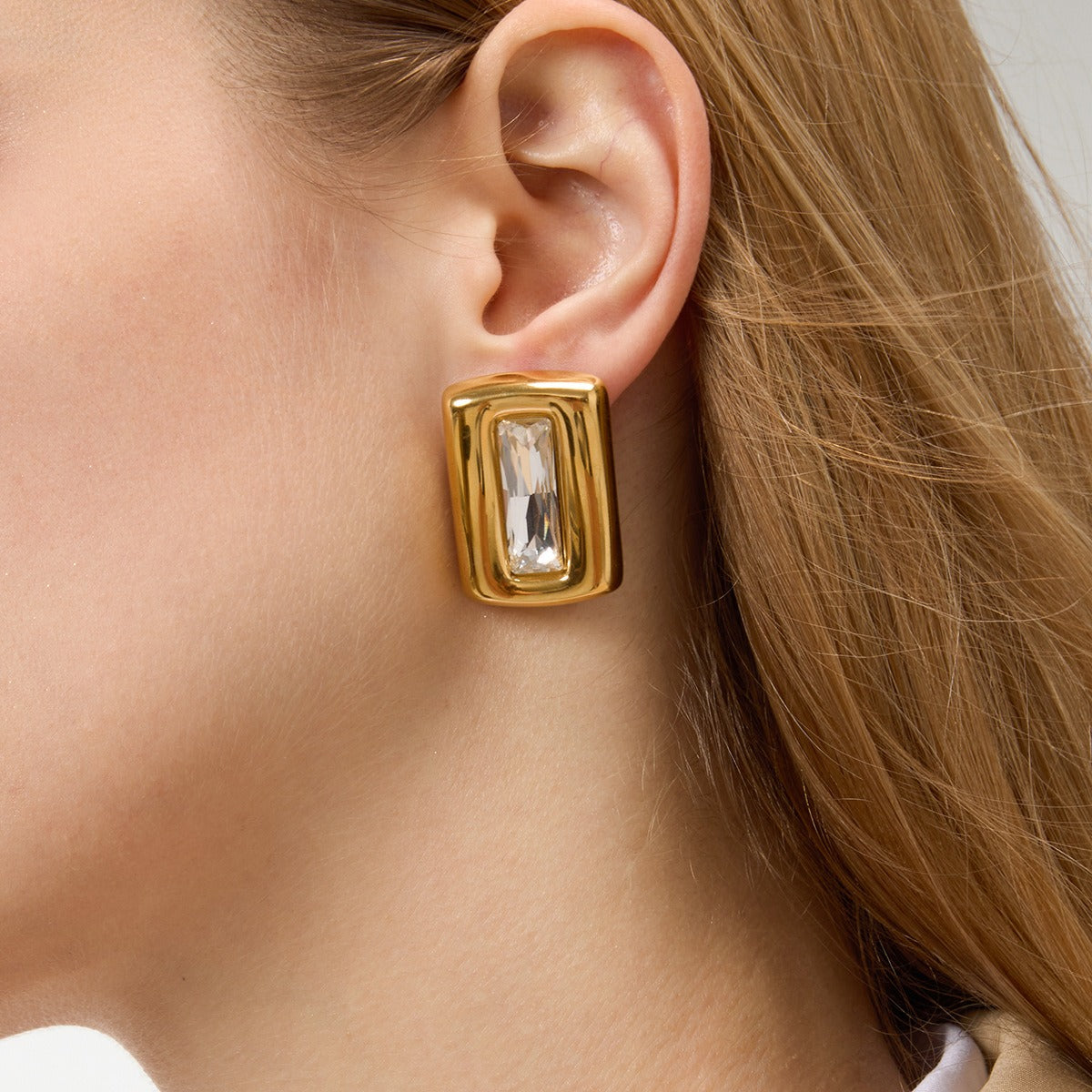 Square 18K gold-plated titanium steel stud earrings with embedded cubic zirconia. Vera Lux