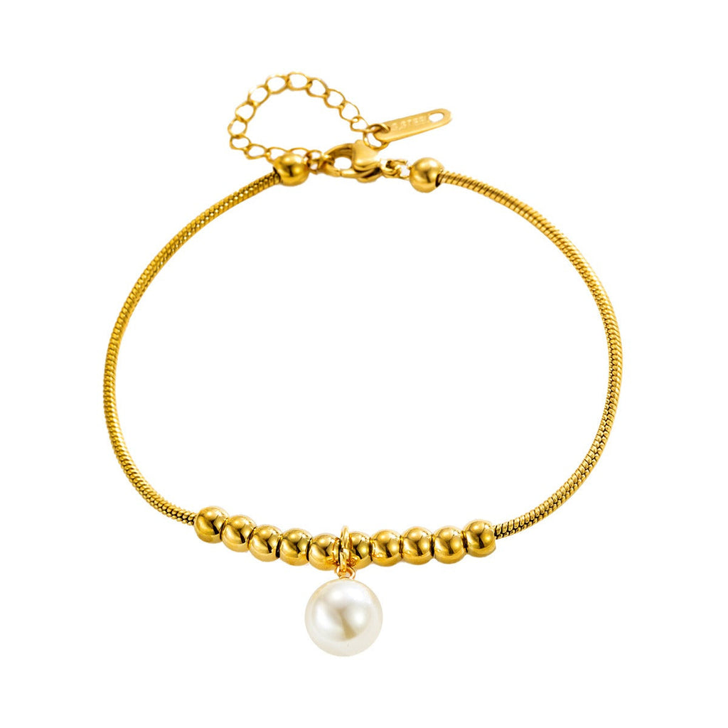 18k gold snake bone beaded anklet with a large heart-shaped heart Vera Lux