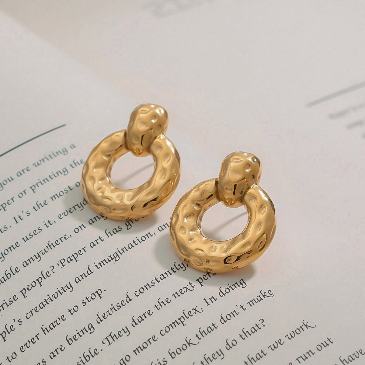 18K gold hollow round with texture design unique personality earrings18K gold hollow round with texture design unique personality earrings Vera Lux