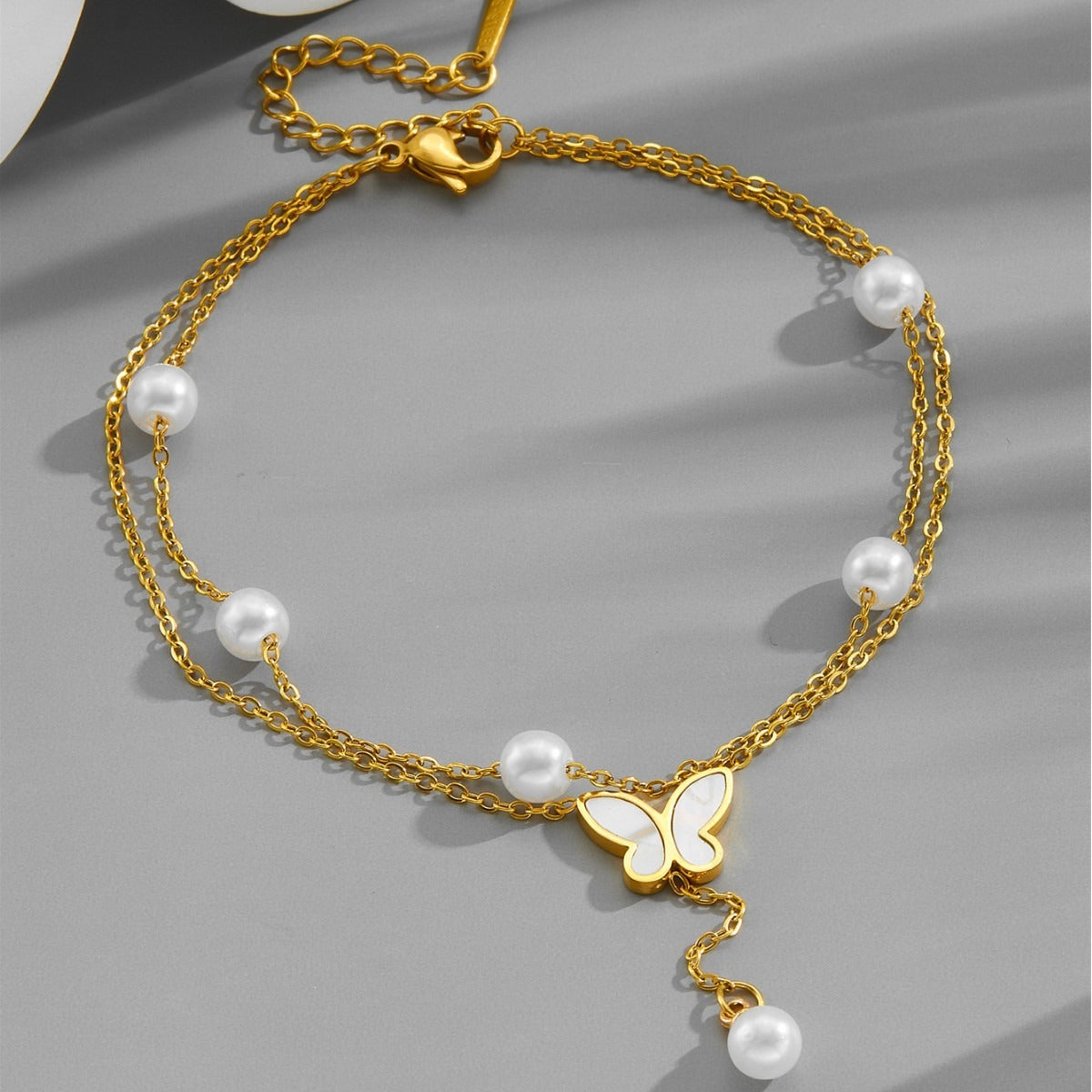 18k gold light luxury multi-layer stacked pearl butterfly tassel anklet Vera Lux