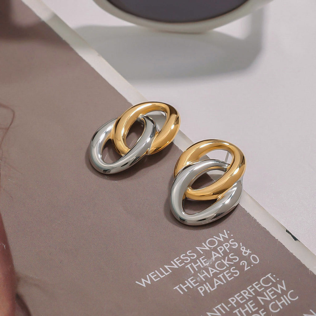 18K gold hollow oval earrings with gold and silver color matching design, simple and elegant Vera Lux