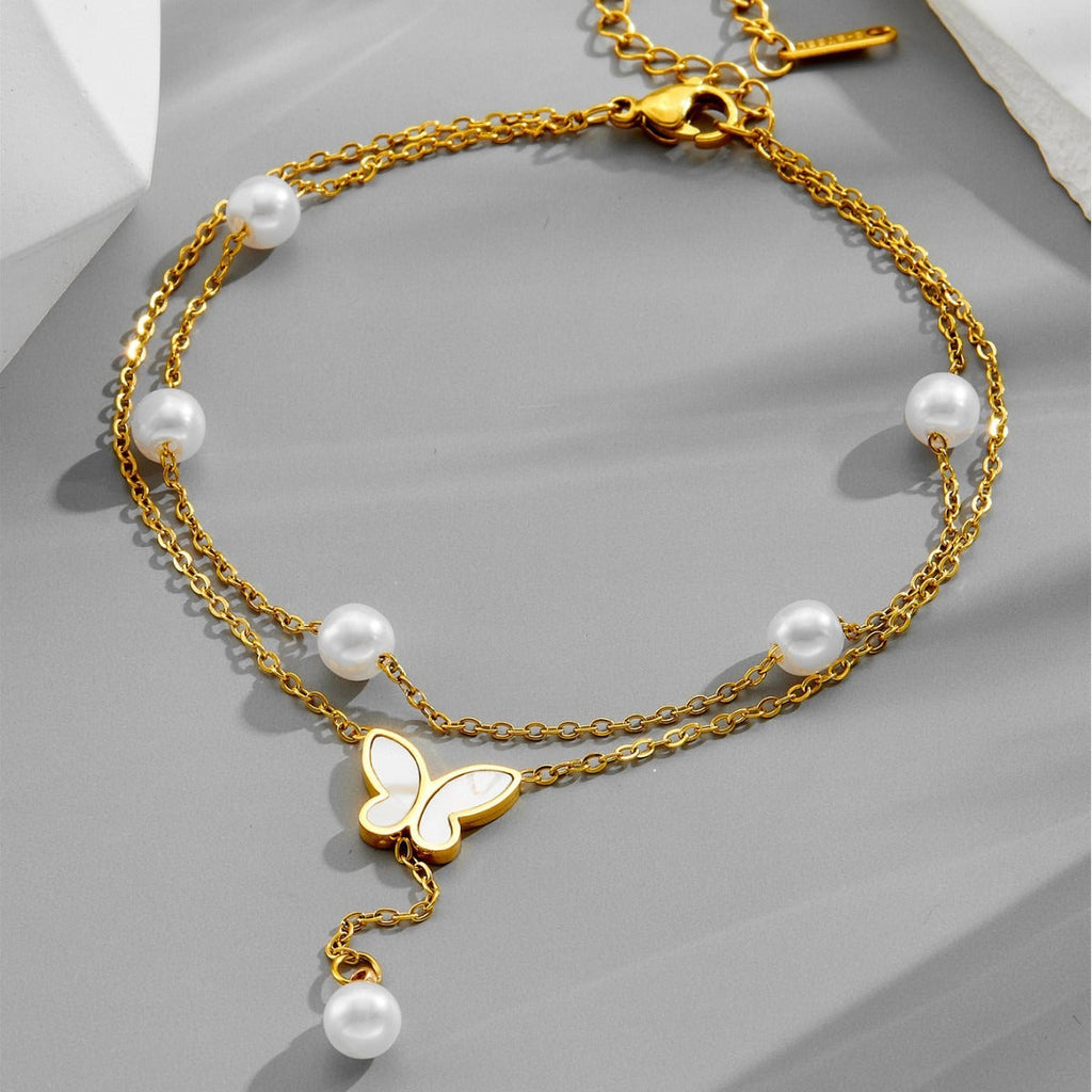 Light luxury multi-layer stacked pearl butterfly tassel titanium steel anklet Vera Lux