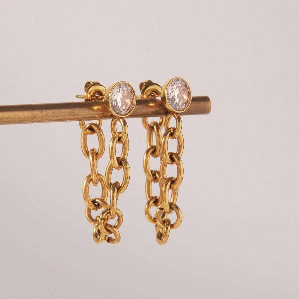 18K gold lightweight luxury earrings with zircon and tassel design. Vera Lux
