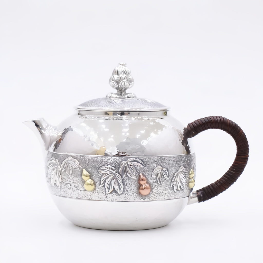 Pure 999 Fine Silver Handcrafted Silver Teapot with Embossed Leaf and Gourd Motifs and Woven Handle - Handicraft Vera Lux