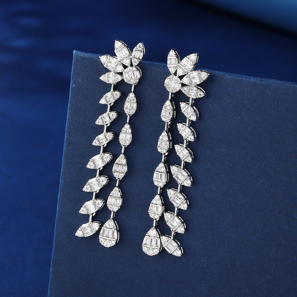 Floral design, fully encrusted with diamonds, double chain leaf earrings. Vera Lux