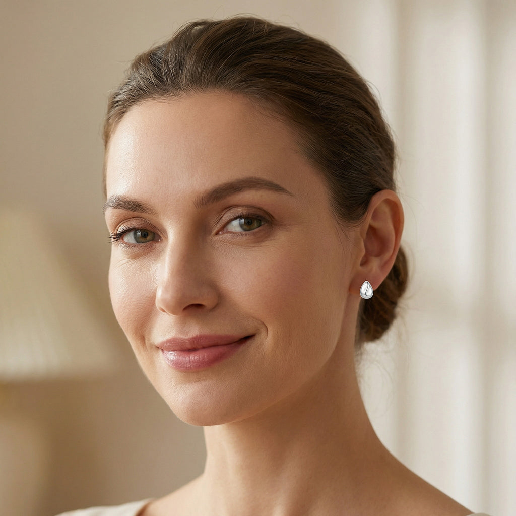 925 Sterling Silver Minimalist Polished Silver Teardrop Stud Earrings with Sculptural Wave Detail Vera Lux