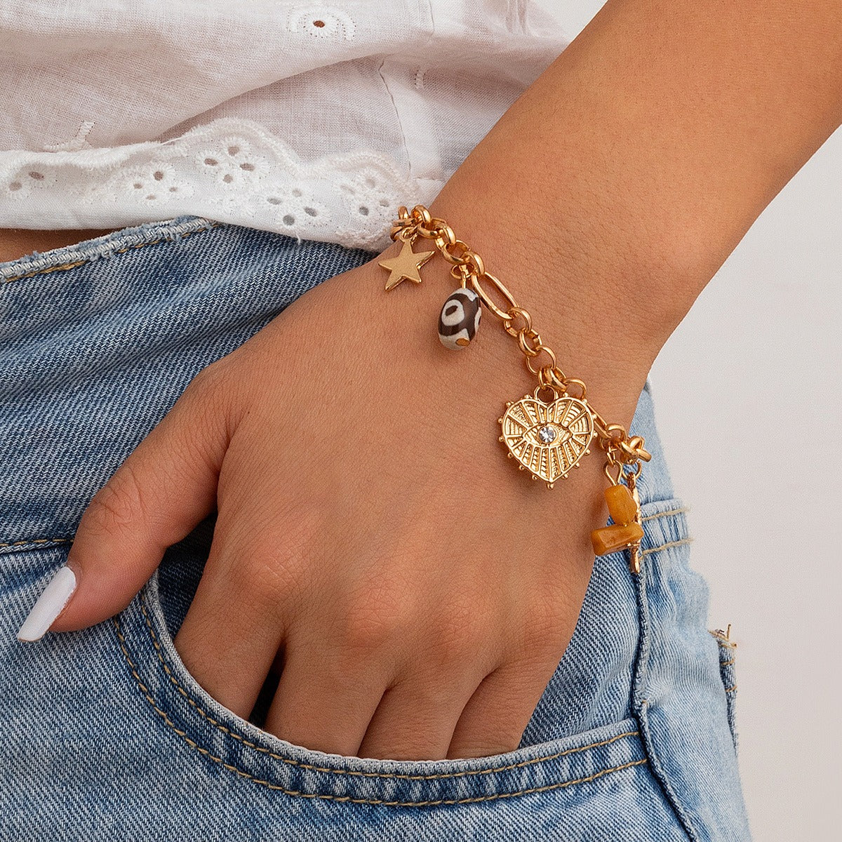 Retro elephant bull head personality niche peach heart imitation pearl shell bracelet Vera Lux