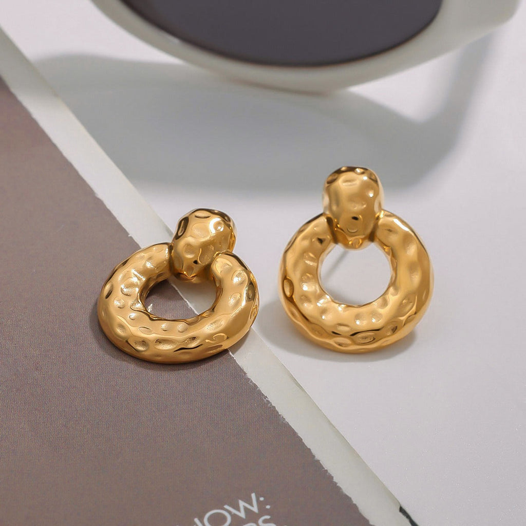 18K gold hollow round with texture design unique personality earrings18K gold hollow round with texture design unique personality earrings Vera Lux