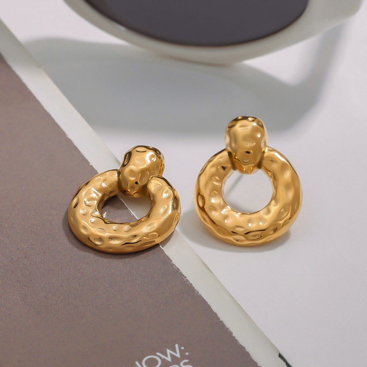 18K gold hollow round with texture design unique personality earrings18K gold hollow round with texture design unique personality earrings Vera Lux