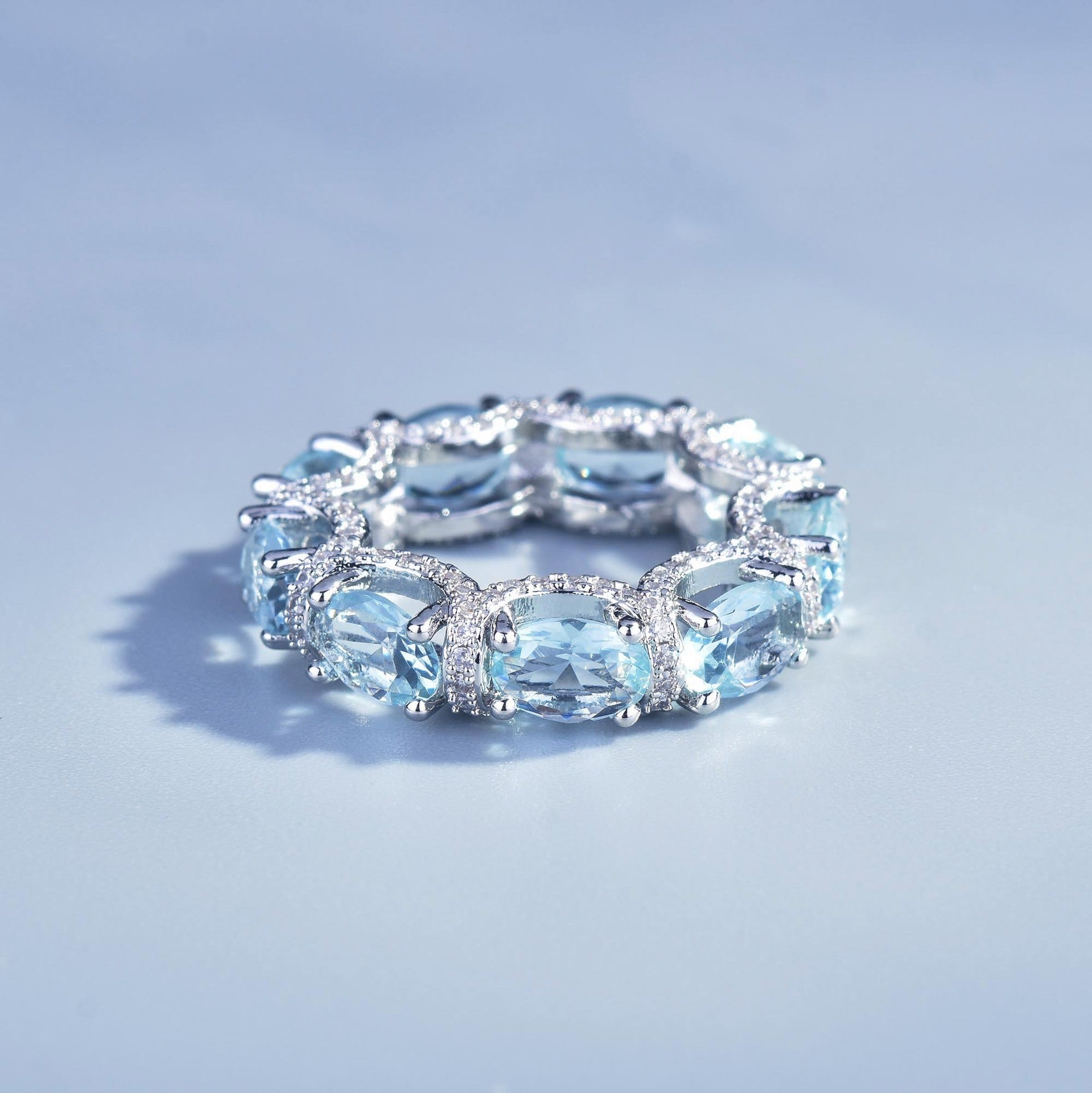 Luxury Oval Cut Aquamarine Eternity Band Ring, Micro Pave Blue Gemstone Stackable Ring For Women Vera Lux