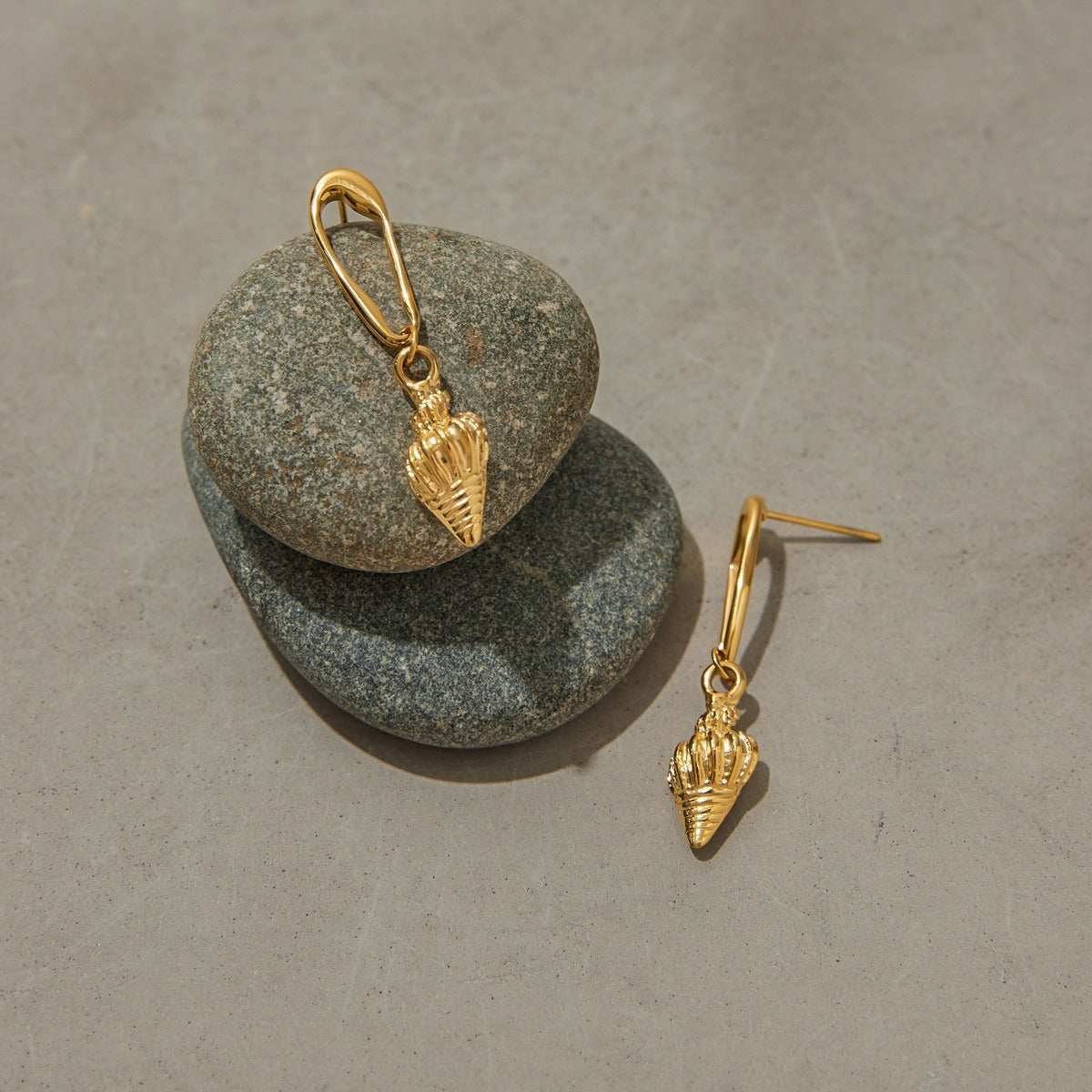 18K gold conch-shaped earrings with textured beach style Vera Lux