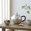 Pure 999 Fine Silver Handcrafted Silver Teapot with Embossed Leaf and Gourd Motifs and Woven Handle - Handicraft Vera Lux