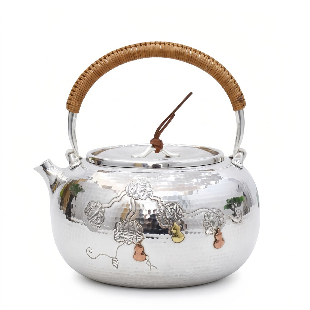 Pure 999 Fine Silver Handcrafted Hammered Silver Teapot with Gourd Vine Relief and Rattan Handle - Handicraft Vera Lux