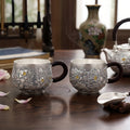 Pure 999 Fine Silver Elegant Handcrafted Silver Teacups Featuring Detailed Peony Relief and Traditional Woven Handles - Handicraft Vera Lux