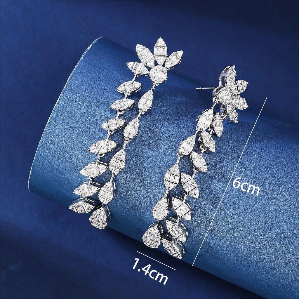 Floral design, fully encrusted with diamonds, double chain leaf earrings. Vera Lux