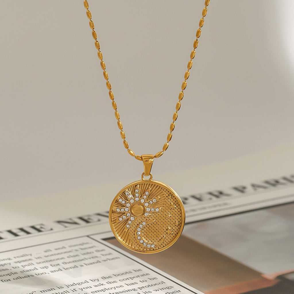18K gold round necklace with sun and moon pattern and diamond design Vera Lux