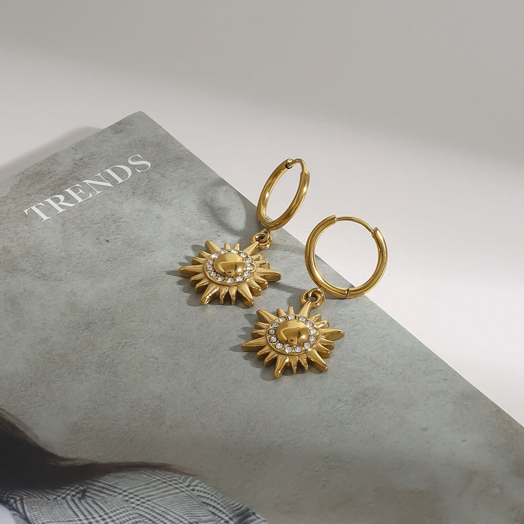 18k gold sun-shaped diamond-studded earrings with unique design Vera Lux
