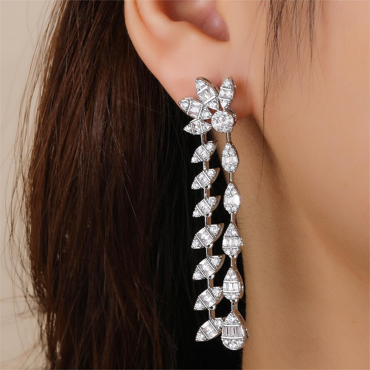 Floral design, fully encrusted with diamonds, double chain leaf earrings. Vera Lux
