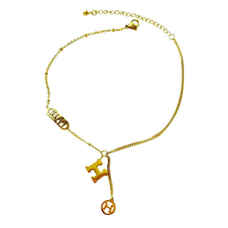 Titanium steel and 18k gold letter H tassel anklet Vera Lux