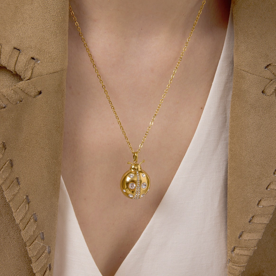 18k gold ladybug titanium steel necklace and earrings Vera Lux
