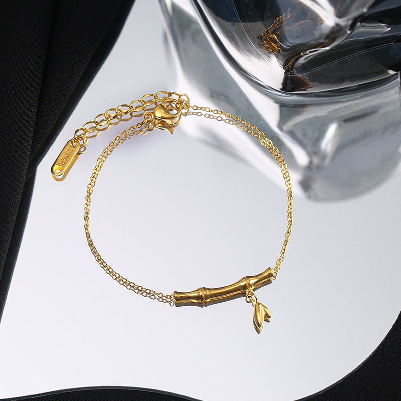 18k gold rising step by step titanium steel bamboo anklet Vera Lux