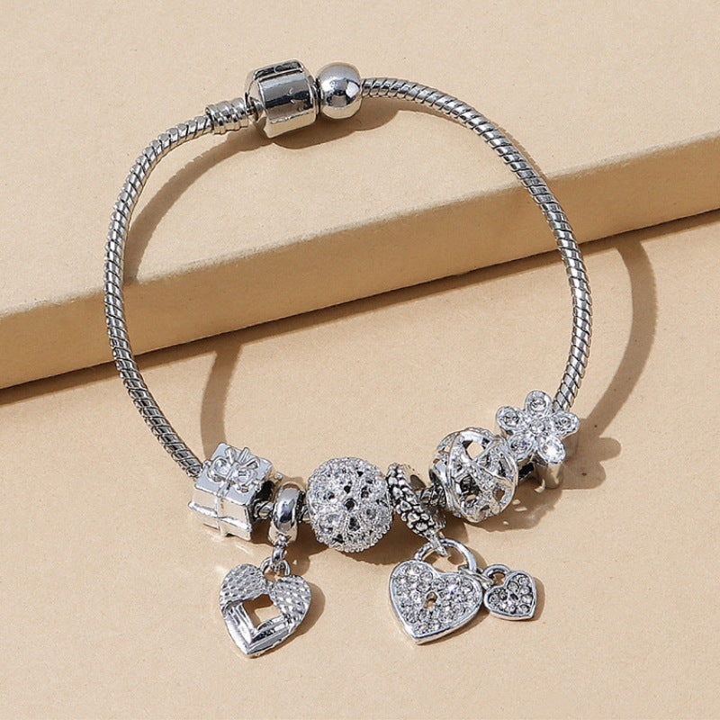 Charity Sparkling Diamond-Encrusted Rose Gold Beaded Hollow Carved Bracelet Vera Lux