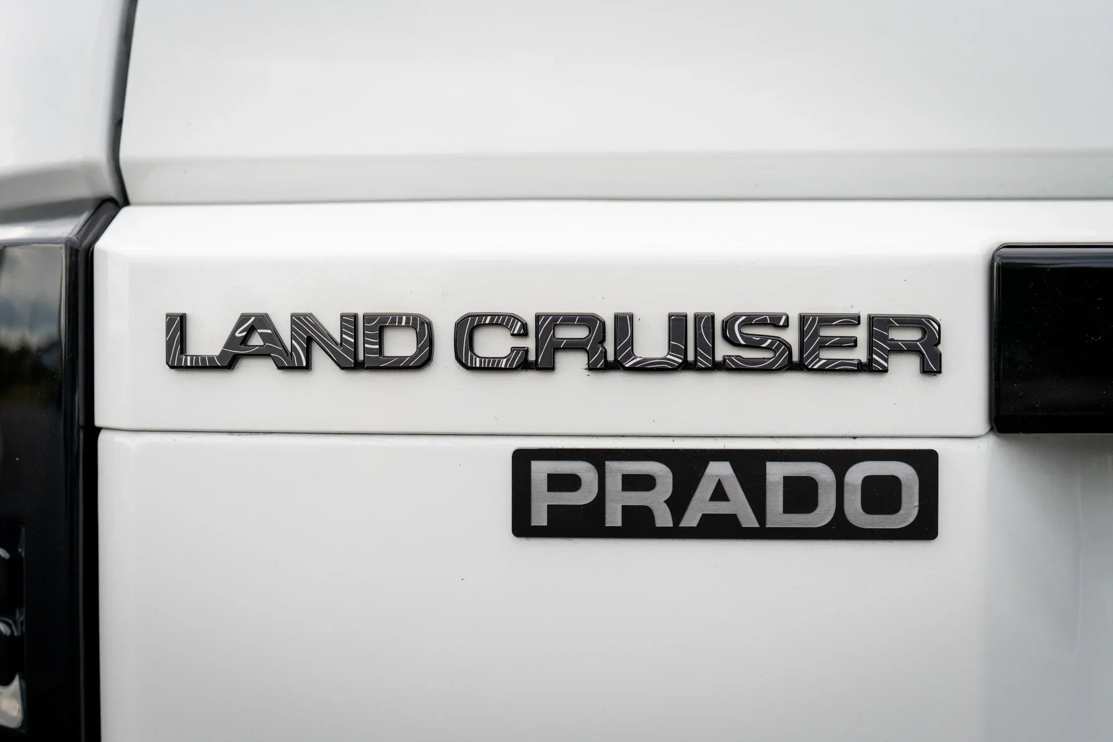 "Land Cruiser" Topographic Rear Tailgate Emblem Overlays - 2024+ Land Cruiser StickerFab