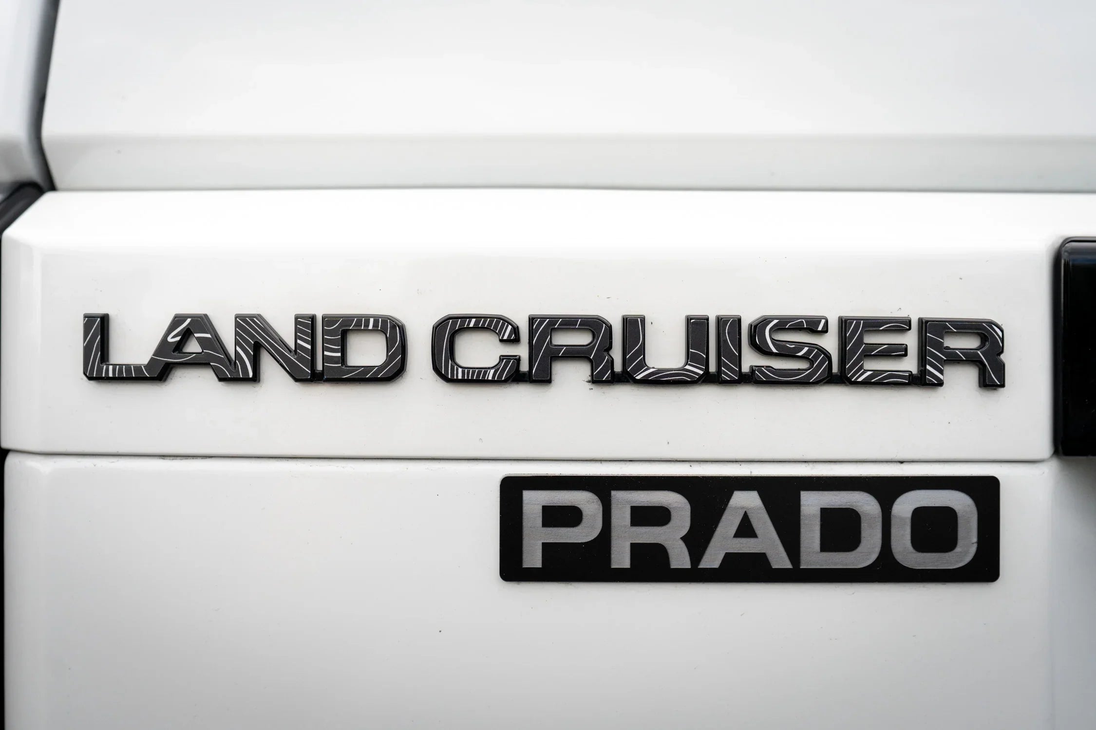 "Land Cruiser" Topographic Rear Tailgate Emblem Overlays - 2024+ Land Cruiser StickerFab