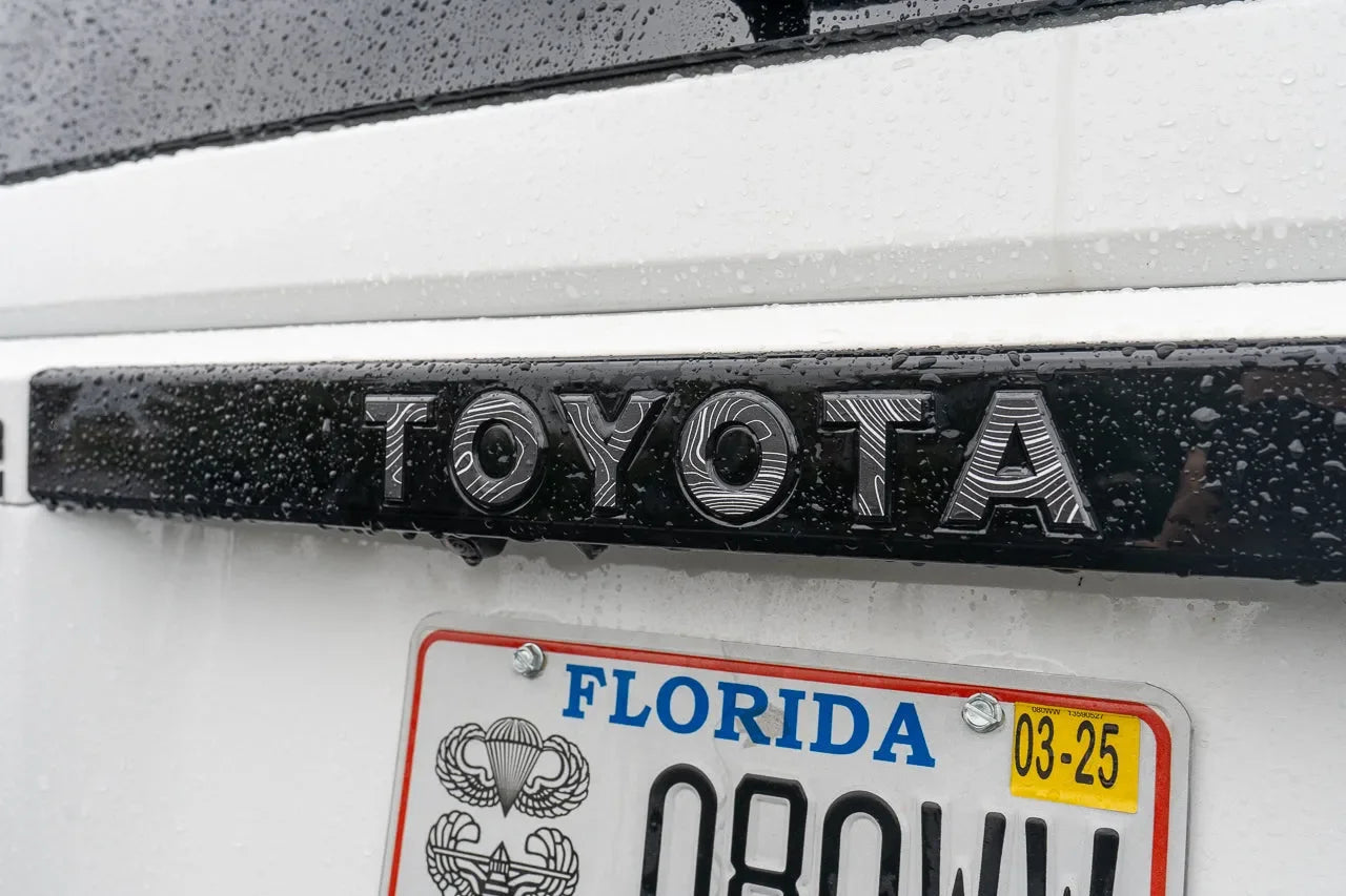 "TOYOTA" Topo Rear Tailgate Emblem Overlays - 2024+ Land Cruiser StickerFab