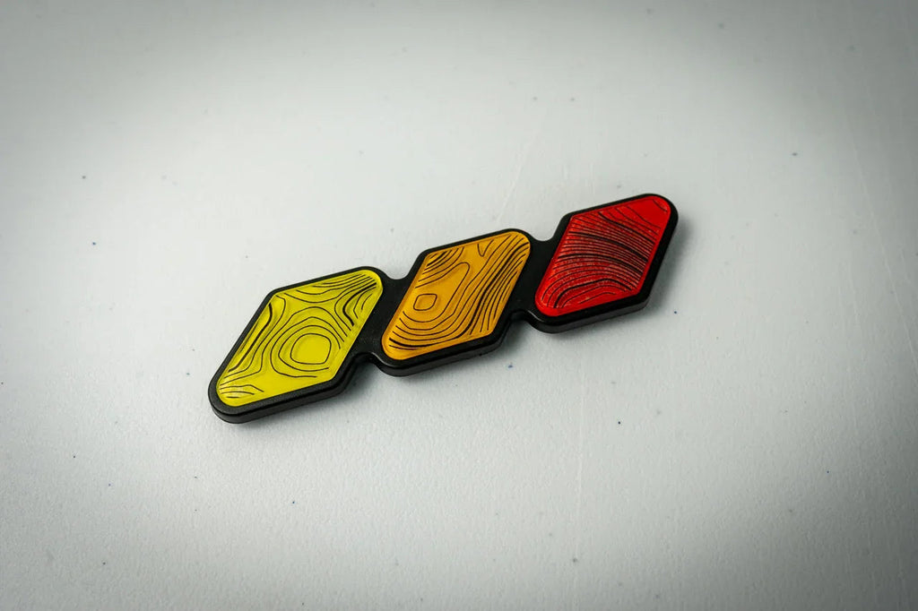 Tri Color Topographic Grille Emblem - 2024+ Land Cruiser / 2016-2013 Tacoma StickerFab