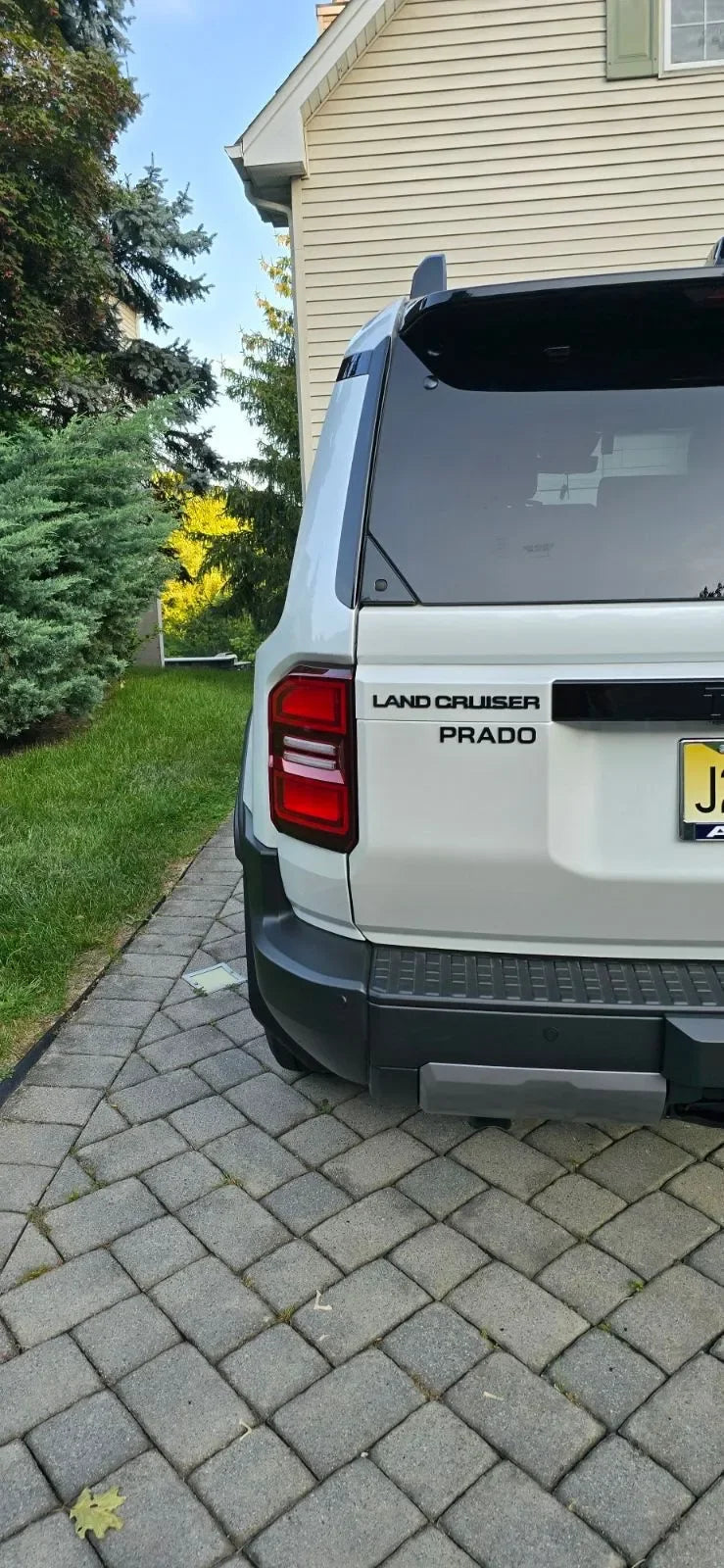 Black "PRADO" Acrylic Emblem - 2024+ Land Cruiser StickerFab