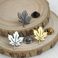 New maple leaf men's lapel pin, 316L stainless steel gold-plated badge, black brooch for suit accessories, gift for father Vera Lux
