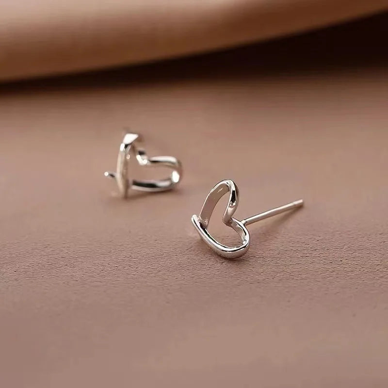 S925Silver Hollow out heart-shaped earrings for women, simple, light, luxurious, high-end, heart-shaped ins, high-end Vera Lux