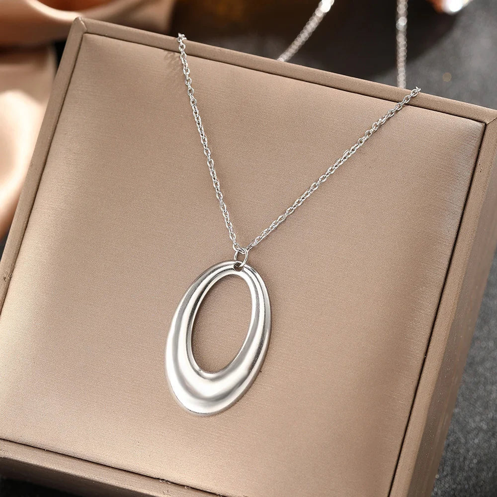 DOTIFI  Stainless Steel Delicate Hollow Arc Circle Geometric Pendant Necklace Female Fashion Minimalist Commuter Long Necklace Vera Lux