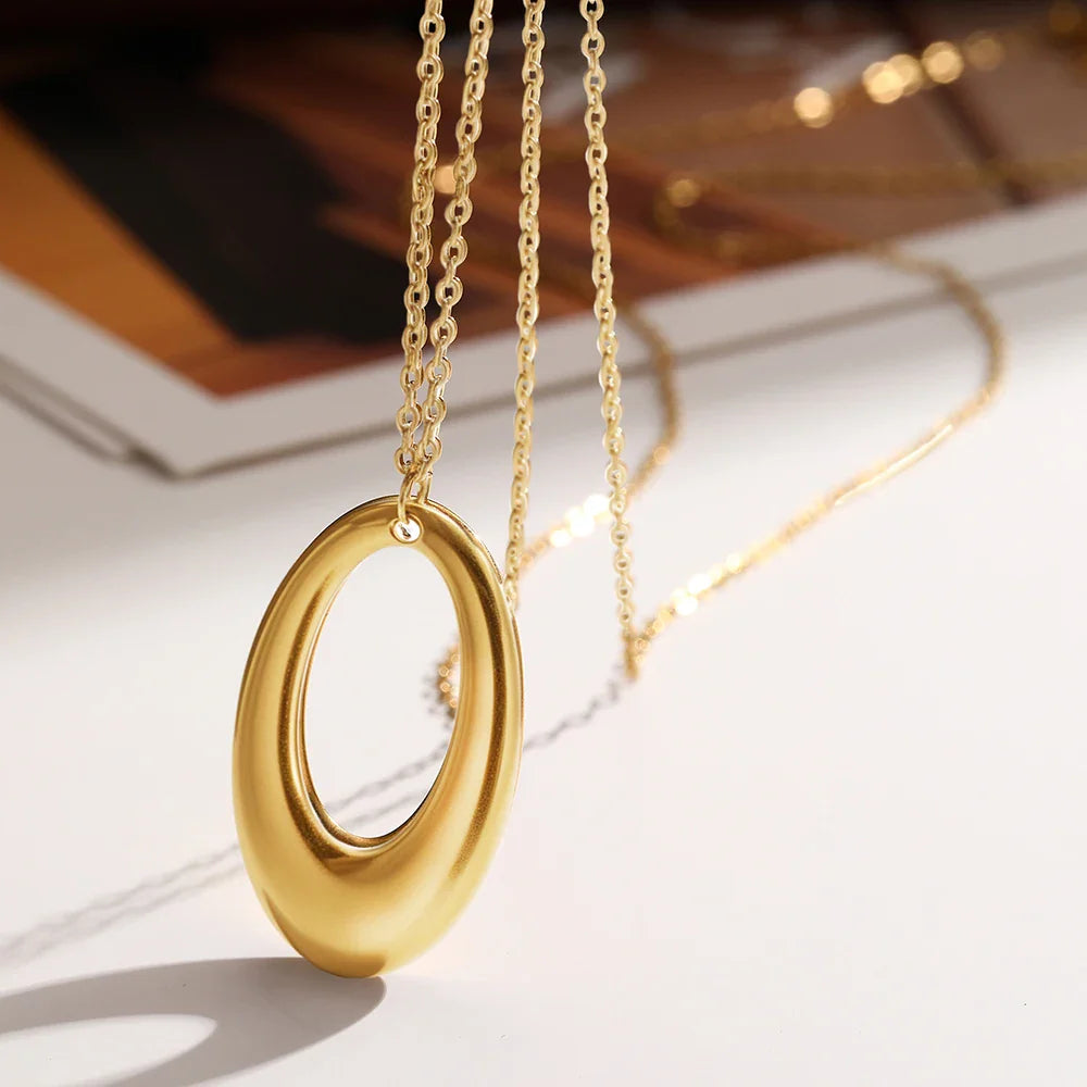 DOTIFI  Stainless Steel Delicate Hollow Arc Circle Geometric Pendant Necklace Female Fashion Minimalist Commuter Long Necklace Vera Lux