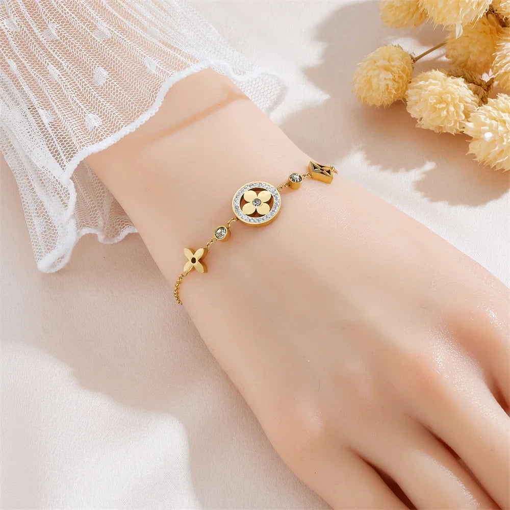 Elegant Temperament Premium Sense Of One Hundred Stainless Steel Four-Leaf Clover Round Pendant Flower Earrings Female Vera Lux