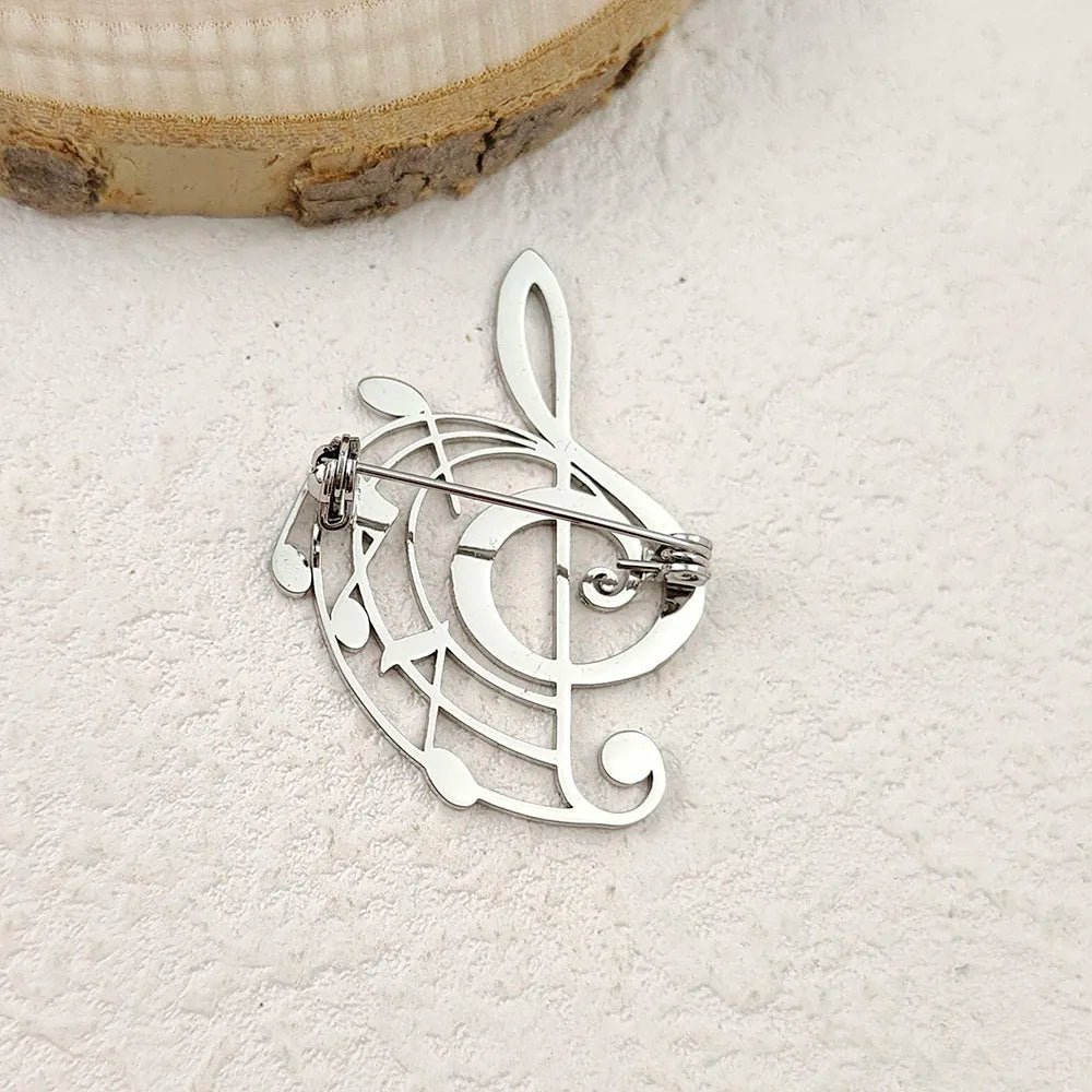 Creative punk style hollow music symbol stainless steel gold-plated 18K brooch, black suit accessories, wedding matching set Vera Lux